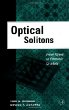 Optical Solitons : From Fibers to Photonic Crystals